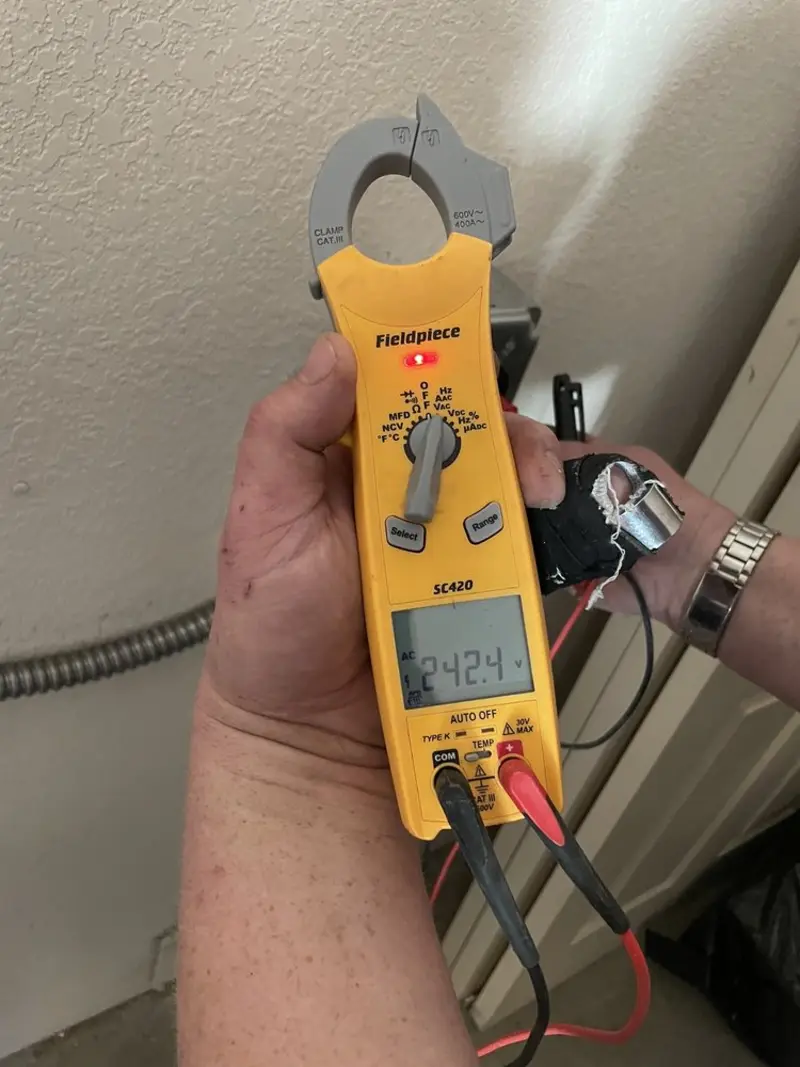 Voltage testing with clamp meter during Generator Installation in Cody
